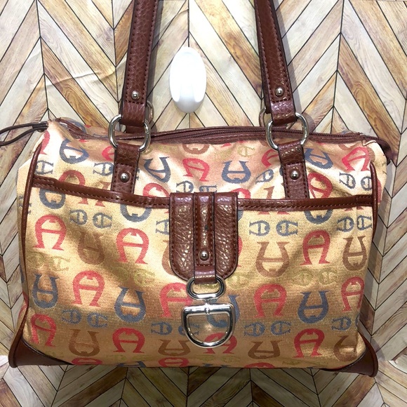 Etienne Aigner Handbags - Vintage 1992 Etienne Aigner Tote.Mint condition.Golden tan canvas.logo p…
